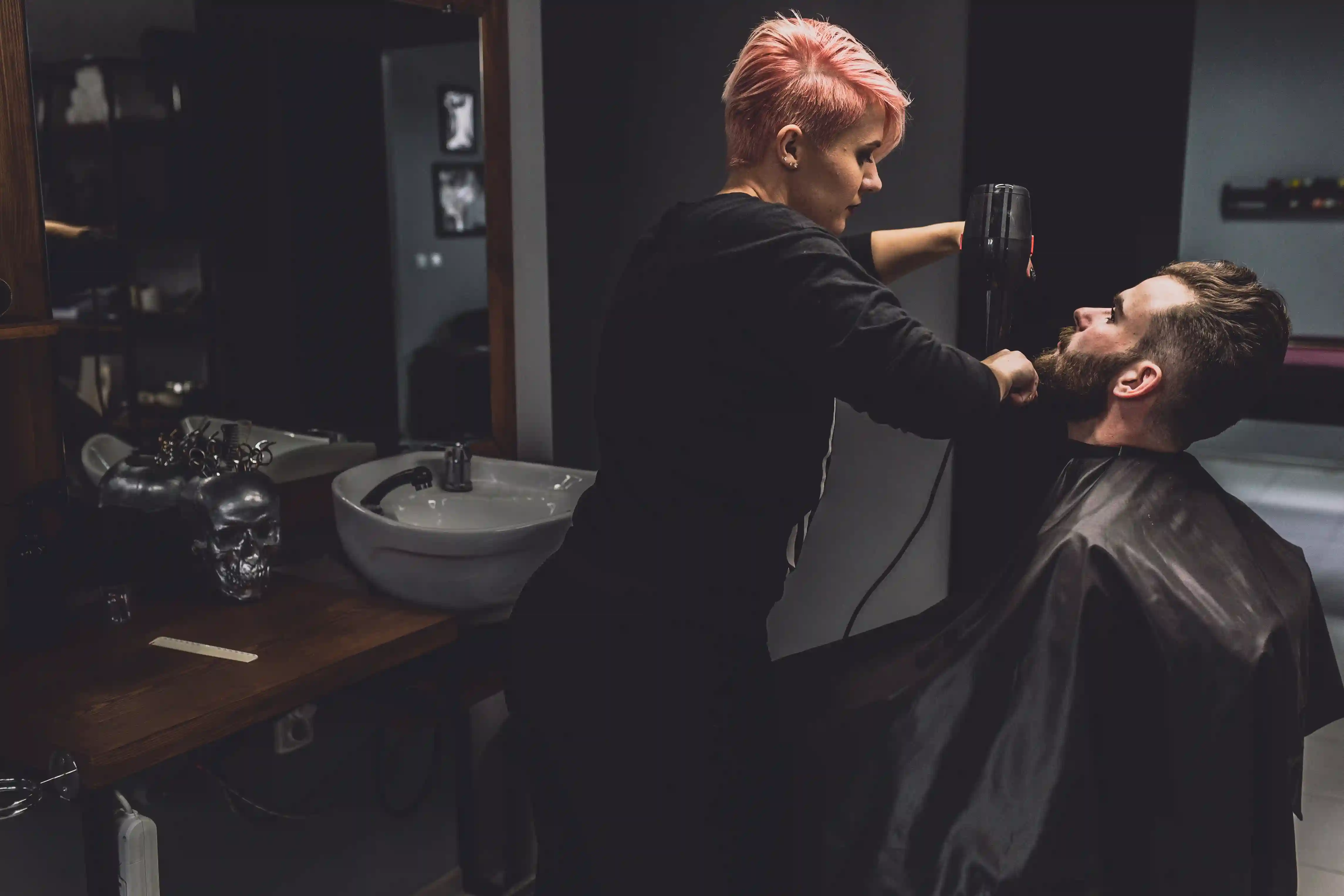 Professional barber cutting hair with precision